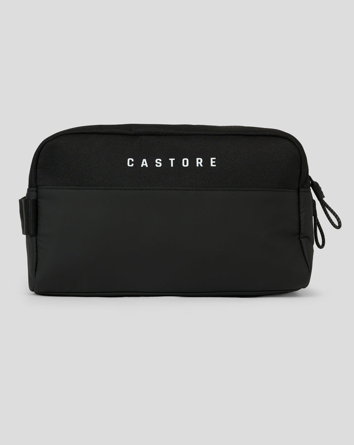 Black Castore Toilettas with a carry loop and top zipper for easy access.