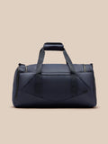 Navy Core Holdall shown from a front angle with top handles and crossbody strap, logo on the front.