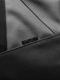 Close-up of the holdall exterior highlighting durable material and the ProTek water resistant finish.