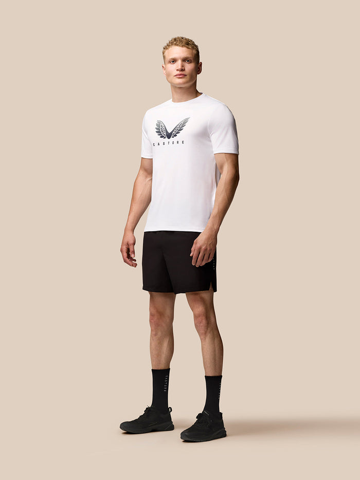 Close-up of white Adapt Graphic T Shirt chest featuring the Castore wing graphic