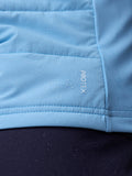Close-up of light blue fabric showing the ProTek logo and water droplets.
