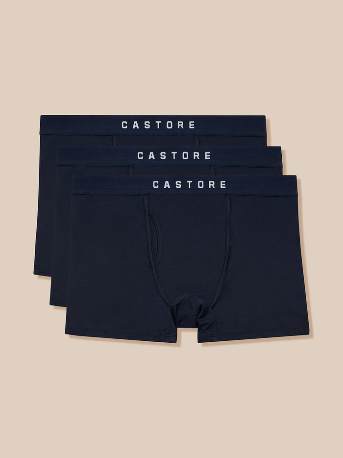 Set of three navy blue boxer briefs with Castore waistband visible