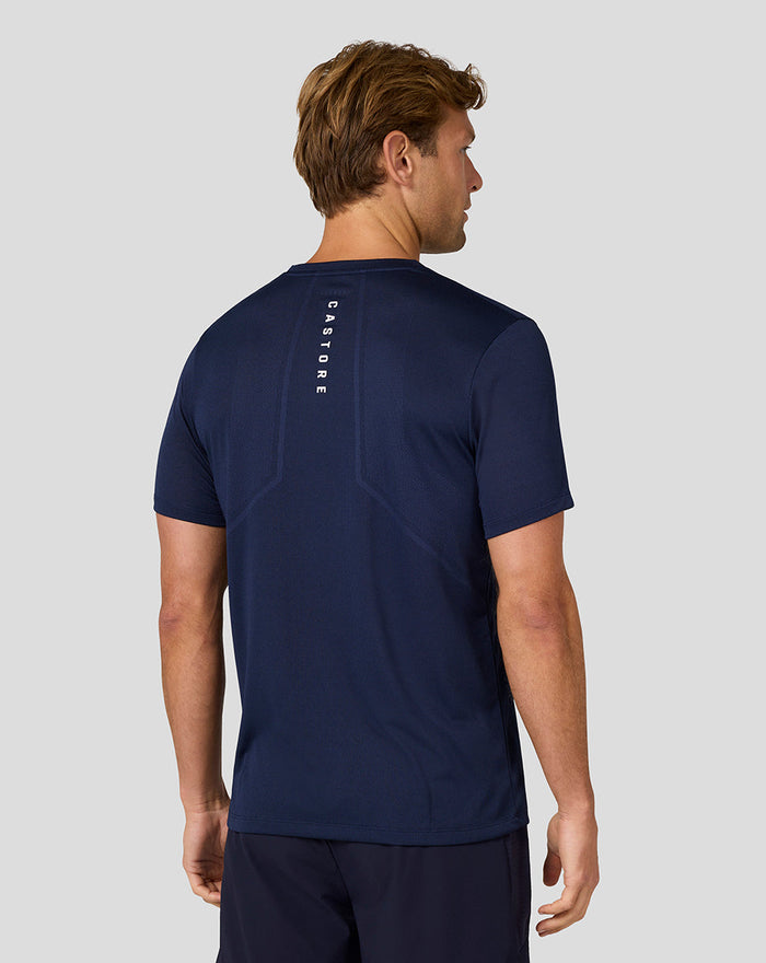 Back view of navy Apex Engineered Knit T Shirt for men with vertical CASTORE branding on the upper back.