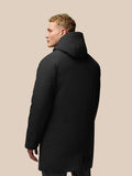 Back view of a long black hooded padded jacket with a water resistant ProTek finish.