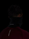 Back view of a person wearing a black Castore unisex core snood around the neck