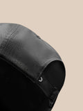 Close up of gray Castore Active Logo Cap showing textured fabric and PROTECT branding along the side