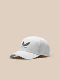 White Castore cap with wing logo on the front shown from the front against a neutral background