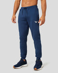 Blue Ore Capsule men's joggers with drawstring and white logo on the thigh designed for recovery.