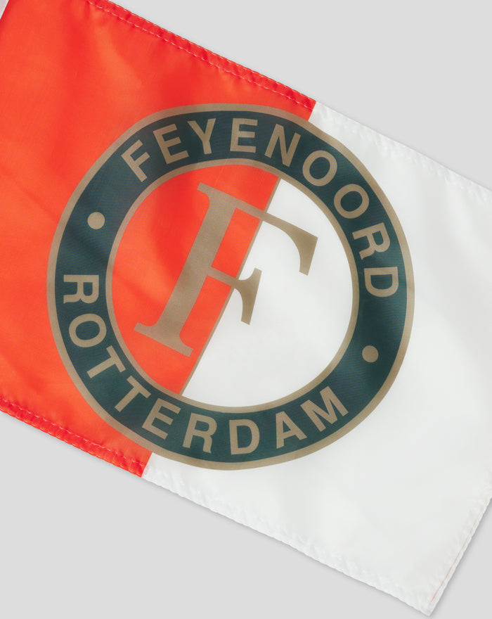 Close up of a Feyenoord car flag showing red orange stripe and circular crest