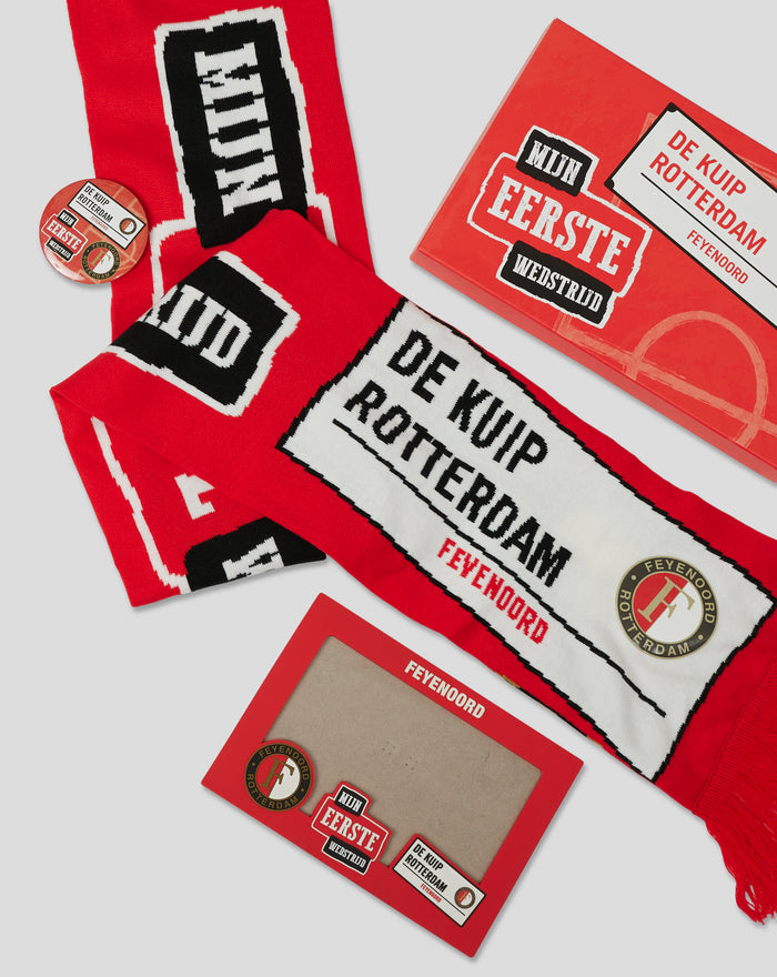 Red Feyenoord scarf with logos and a branded Mijn Eerste Wedstrijd box with stickers and badges