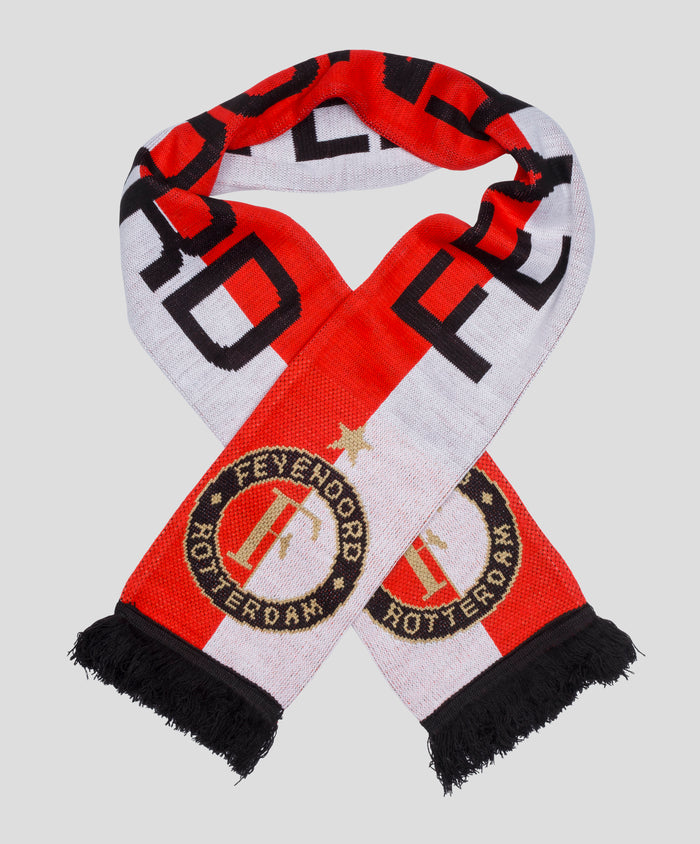 Close up of a red white Feyenoord scarf looped with crest and black fringe ends