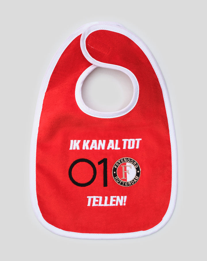 Red Feyenoord baby bib with white trim featuring Ik kan al tot 010 tellen and the club crest