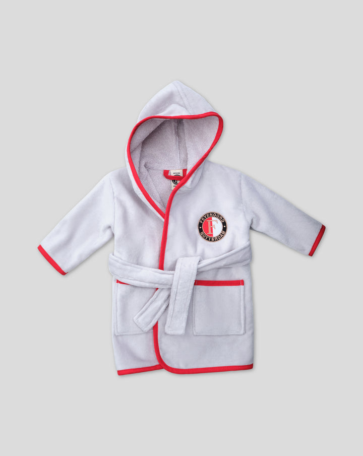 White baby bathrobe with red trim and hood featuring a Feyenoord badge.