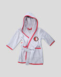 Grey baby robe with red trim and a Feyenoord Rotterdam badge on the chest