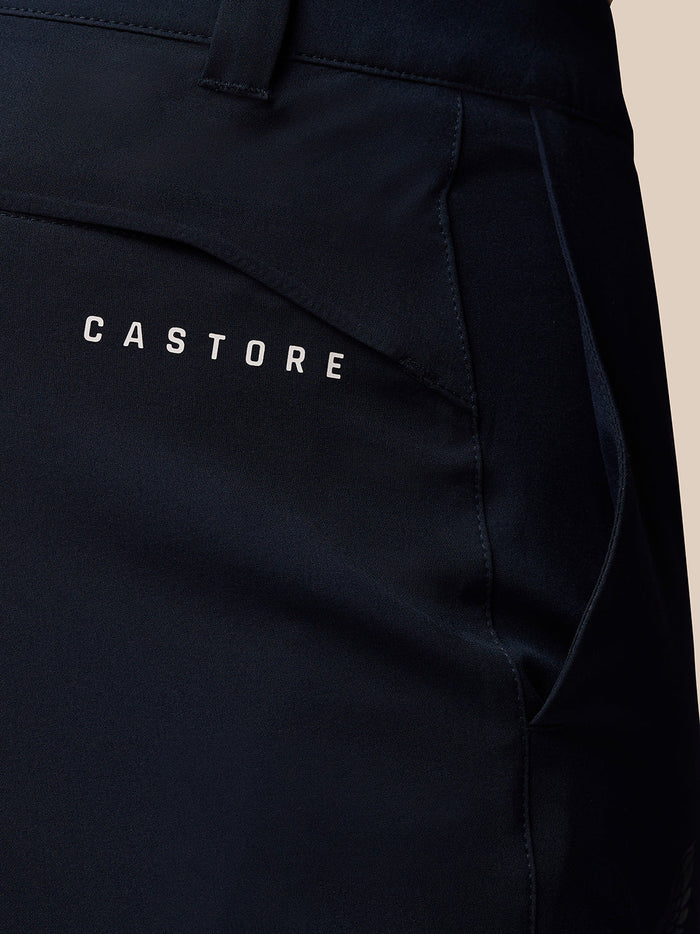 Close up of dark navy Castore Golf Club pant showing front and back pockets and logo.