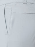 Detail van de PROTEK waterbestendige stof met waterdruppels op de broek.