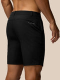 Back view close up of black golf shorts with Castore branding on the rear pocket