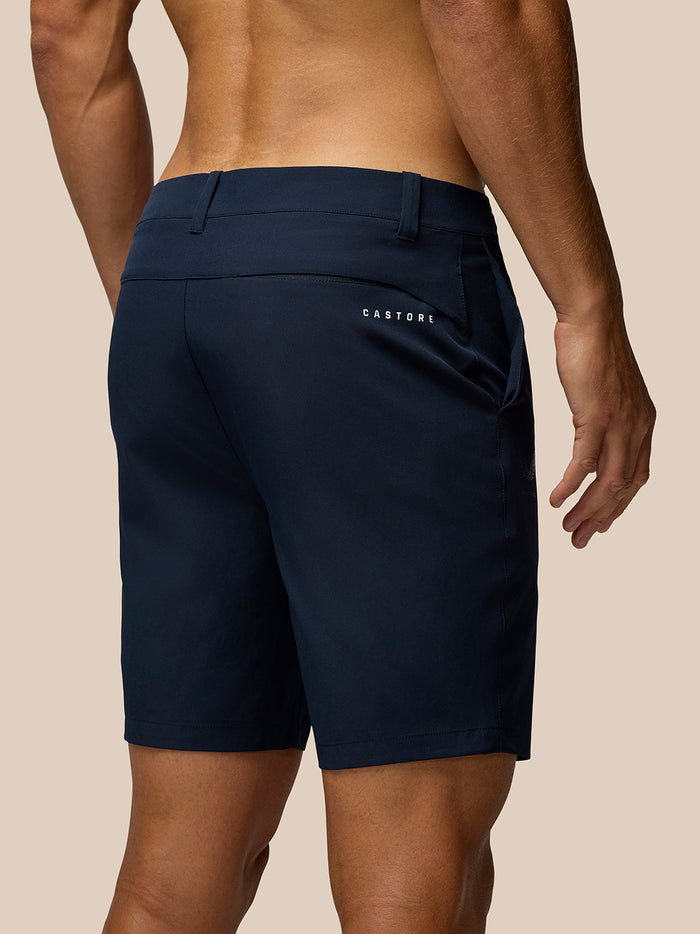 Rear view of navy golf shorts showing Castore branding on the back pocket area