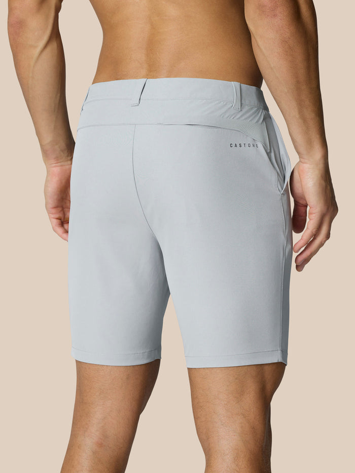 Back view of light gray golf shorts with a right rear pocket and Castore logo