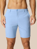 Back view of light blue golf shorts showing Castore logo on the right thigh and rear pocket