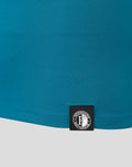 Teal Pinnacle engineered knit golf polo featuring a Feyenoord Rotterdam club badge on the lower front