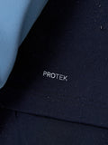 Close-up of navy Pinnacle fabric with Protek branding and raindrops