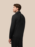 Back view of the black Golf Pinnacle Jas jacket showing a vertical Castore logo along the upper back