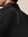 Back view of black Golf Pinnacle jacket with stand up collar and vertical GASTORE branding along the shoulder blade