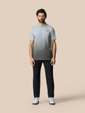 Male model wearing Club Grafische Polo in light gray with an ombre graphic and Castore logo on the chest.