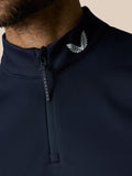 Close-up of navy high collar on the gilet showing a white wing logo and a Castore branded zipper pull.