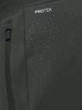 Close-up of dark fabric with water droplets highlighting ProTek water resistance on the joggers.