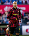 Feyenoord home matchday midlayer top 2025-26 worn by a player during warm-up on the pitch.