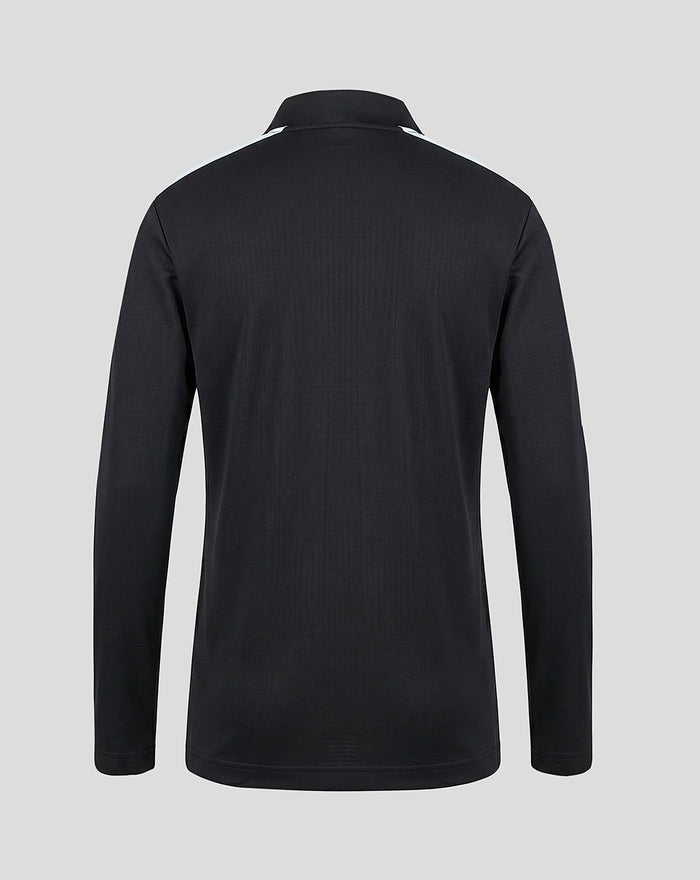 Rear view of a black junior Feyenoord training midlayer jacket with a stand up collar and light blue shoulder panels