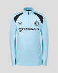 Light blue Feyenoord training midlayer with black shoulder panels and quarter zip, featuring Castore logo and club crest.