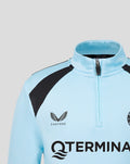 Front close-up of light blue Feyenoord midlayer featuring quarter zip collar crest and sponsor branding