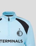 Close-up of light blue Feyenoord junior training midlayer front with quarter zip collar and club crest
