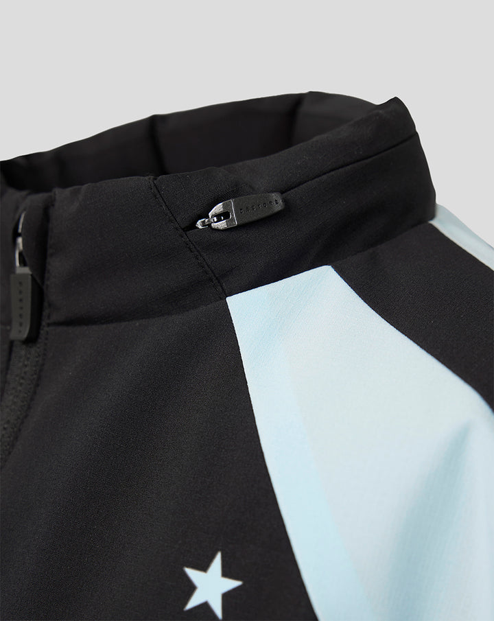 Close up of a Feyenoord training jacket collar in black with a light blue panel and a Castore zipper pull