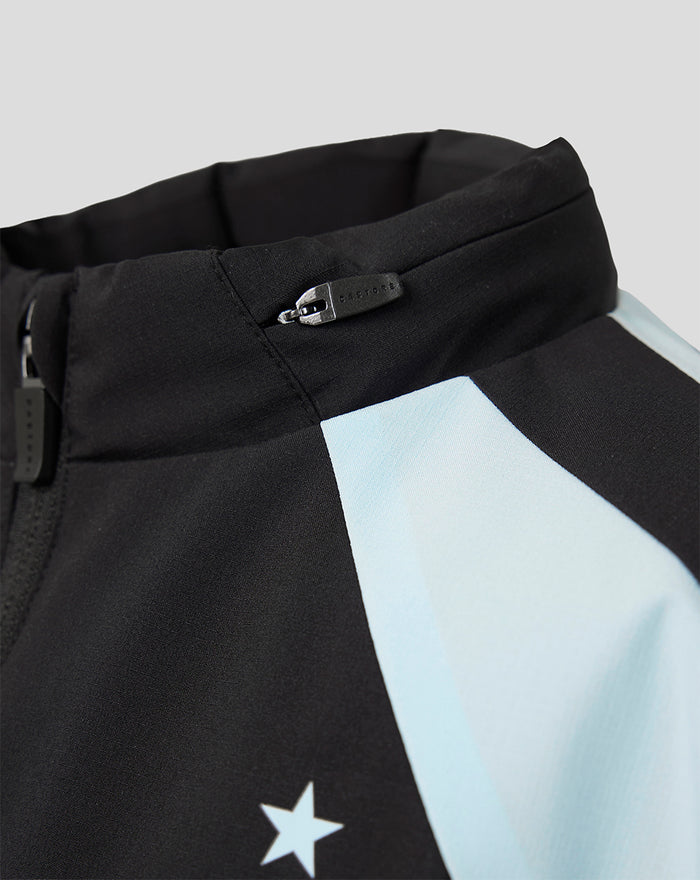 Close up of a Feyenoord training jacket collar in black with a light blue panel and a Castore zipper pull