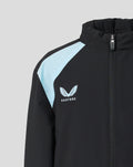 Detail of jacket highlighting Castore logo on the chest and a light blue shoulder panel.