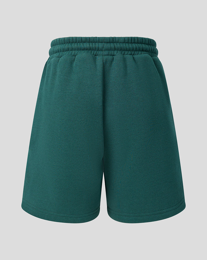Achteraanzicht van groene junior Feyenoord Travel shorts met elastische tailleband.