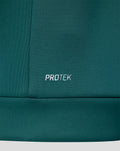 Close-up of teal green fabric with PROTEK branding on the Feyenoord Travel hoodie.