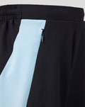 Close up of waistband and side zip pocket on Feyenoord training shorts with a light blue panel.