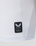 Close up of white Feyenoord jersey fabric with Castore authentic product patch.