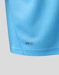 Close up of blue Feyenoord training shirt fabric with AERTEK label at the hem