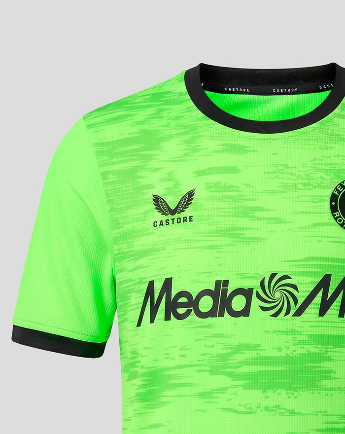 Close up of neon green Feyenoord junior home keeper shirt with black collar and Castore branding.