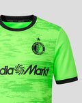 Close up front view of neon green Feyenoord keeper shirt with black collar and cuffs showing the Feyenoord crest on the left chest and the MediaMarkt sponsor
