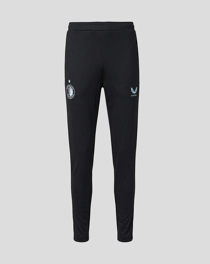 Black slim fit Feyenoord training pants with zip pockets and ankle zips; elastic waist; crest on right leg and Castore logo on left