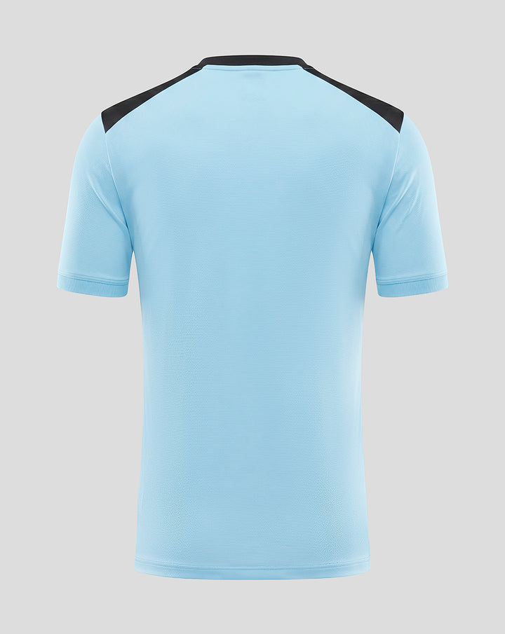 Back view of light blue Feyenoord training shirt with black shoulder panels