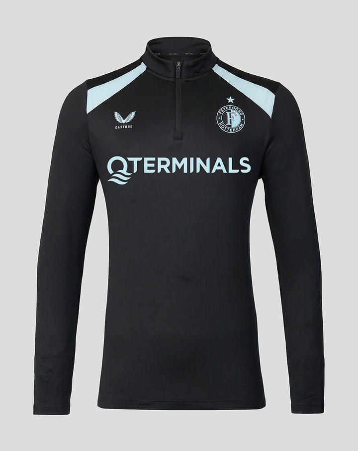 Front view of the men's Feyenoord coaches midlayer in black with light blue shoulder panels and a quarter zip, featuring sponsor and team logos.