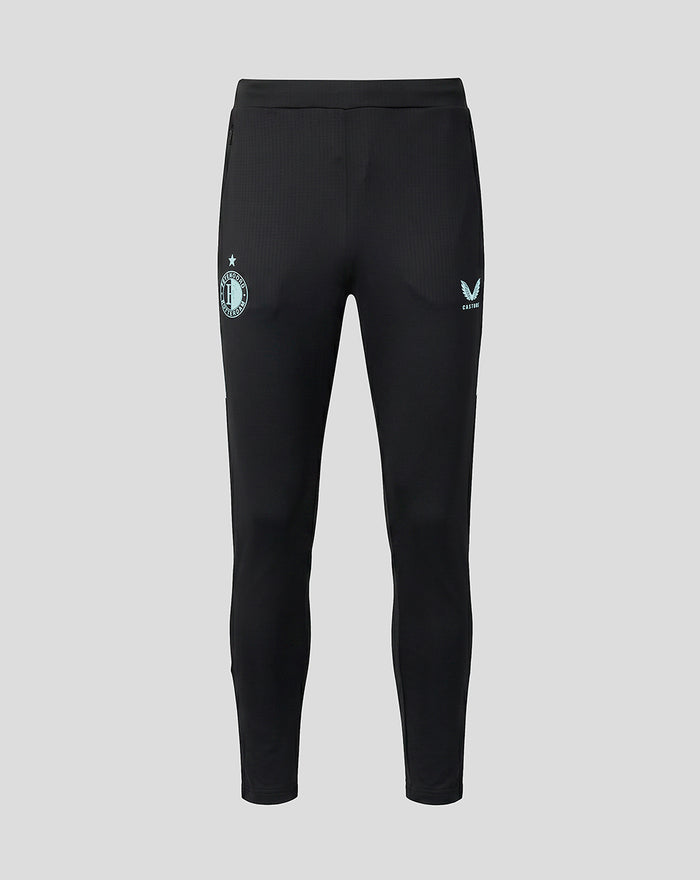 Zwarte trainingsbroek met een lichte textuur, Feyenoord logo op het bovenbeen en Castore logo op het andere been